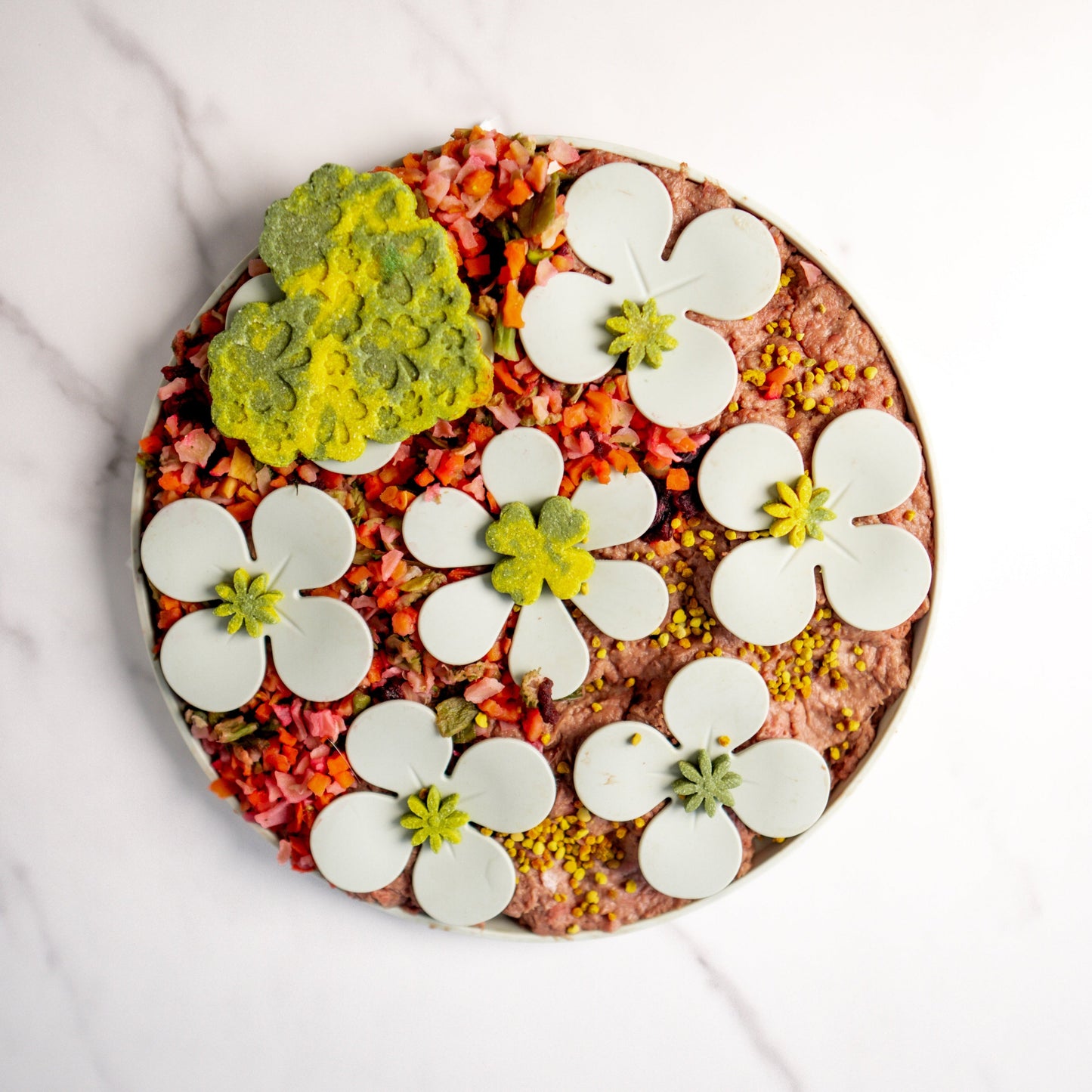 Close-up of colorful floral snuffle mat filled with hidden kibble