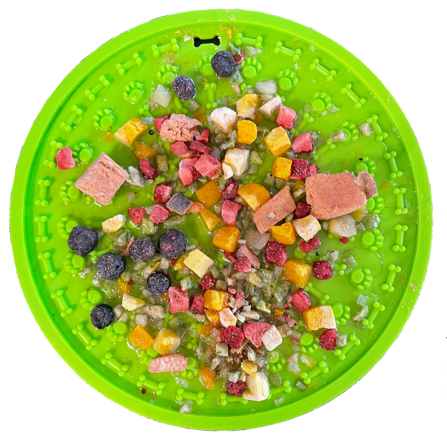 Bare Naked Salmon Mixer Dog Food Topper 6oz pet food puzzle mat with various dog treats on a white background