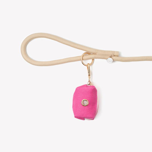 FURLOU magenta poop bag holder with gold hardware

