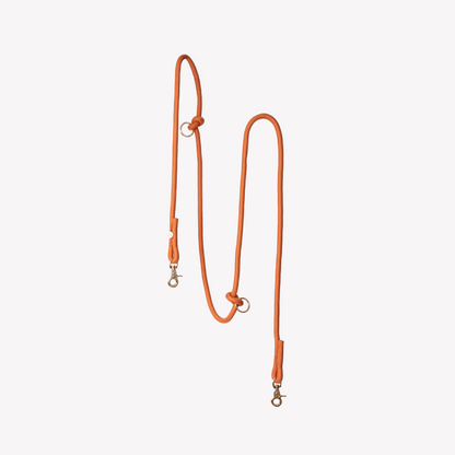 FURLOU hands free braided dog leash in terracotta on a white background