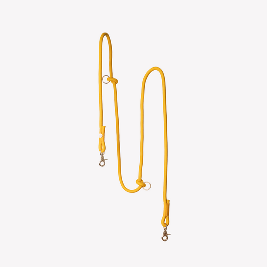 Close up of braided rope texture and gold hardware