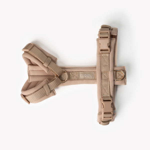 Side view of padded adjustable tan dog harness

