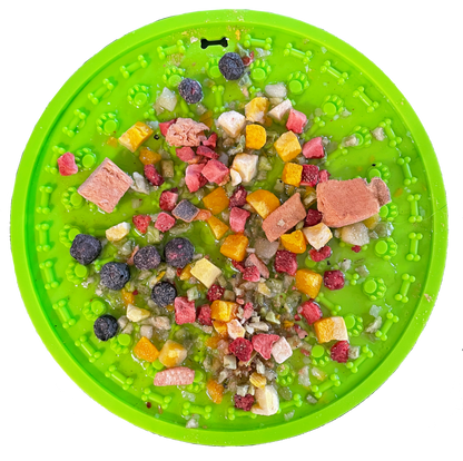 Bare Naked Salmon Mixer Dog Food Topper 6oz   pet food puzzle mat with various dog treats on a white background