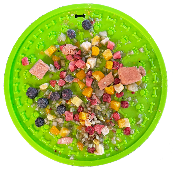Bare Naked Salmon Mixer Dog Food Topper 6oz   pet food puzzle mat with various dog treats on a white background